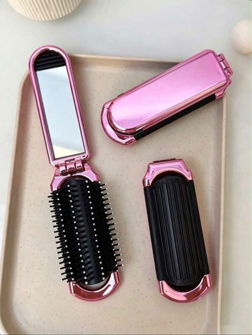 Brosse à cheveux pilable avec miroir intégré